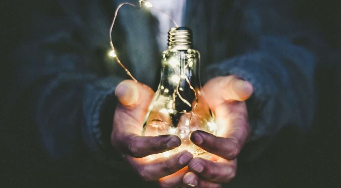 hands with lamp